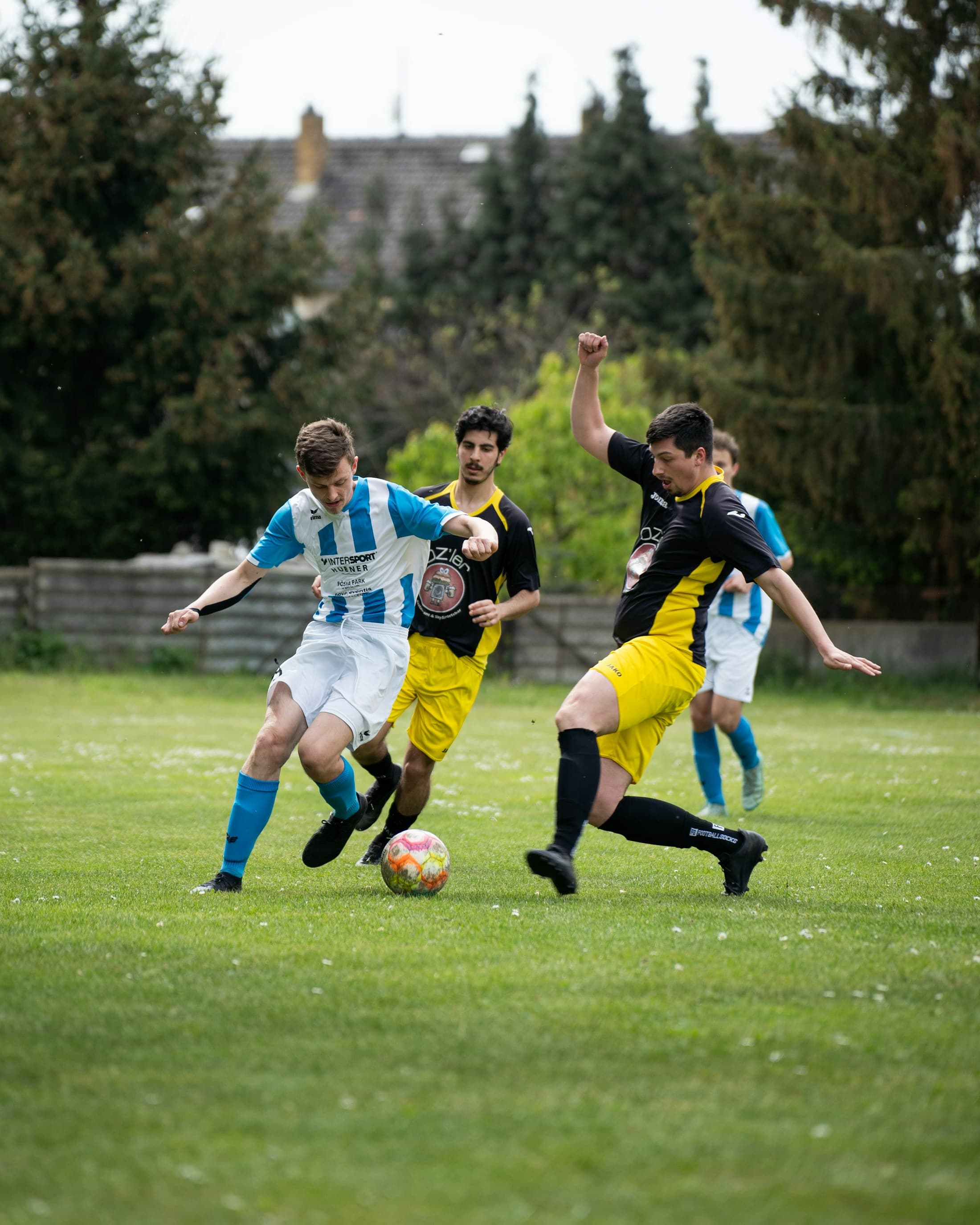 Soccer players competing during a match
